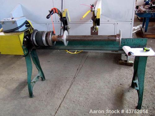 Used Dusenbey 32" Manual Core Cutter. Includes 3" mandrel with 2 blades. 1/2 Hp motor.