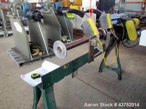 Used Dusenbey 32" Manual Core Cutter. Includes 3" mandrel with 2 blades. 1/2 Hp motor.