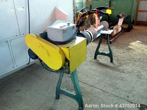 Used Dusenbey 32" Manual Core Cutter. Includes 3" mandrel with 2 blades. 1/2 Hp motor.