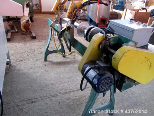 Used Dusenbey 32" Manual Core Cutter. Includes 3" mandrel with 2 blades. 1/2 Hp motor.
