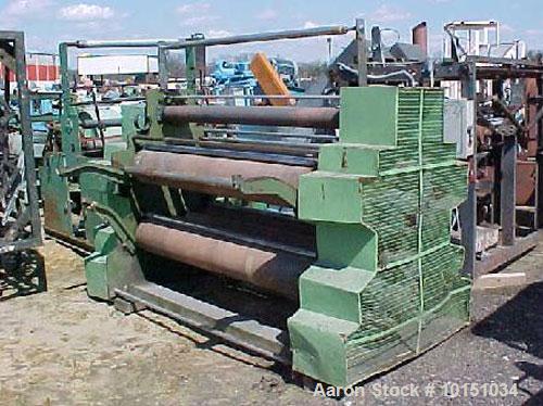 Used-Surface Winder for Blown Film Sheeting. Consists of 4 winding positions 66" wide for up to 24" diameter rolls. Has infe...