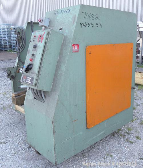 Used Johnson Plastics Machinery Dual Turret Winder, Approximately 36" wide. (1) Adjustable guide roll. Each roll driven by an approximate 2hp motor. Includes control panel. Mounted on casters.