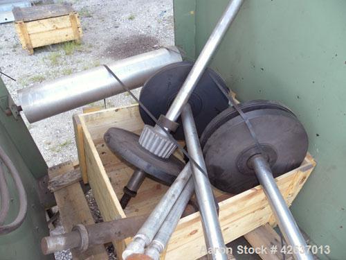 Used Johnson Plastics Machinery Dual Turret Winder, Approximately 36" wide. (1) Adjustable guide roll. Each roll driven by an approximate 2hp motor. Includes control panel. Mounted on casters.