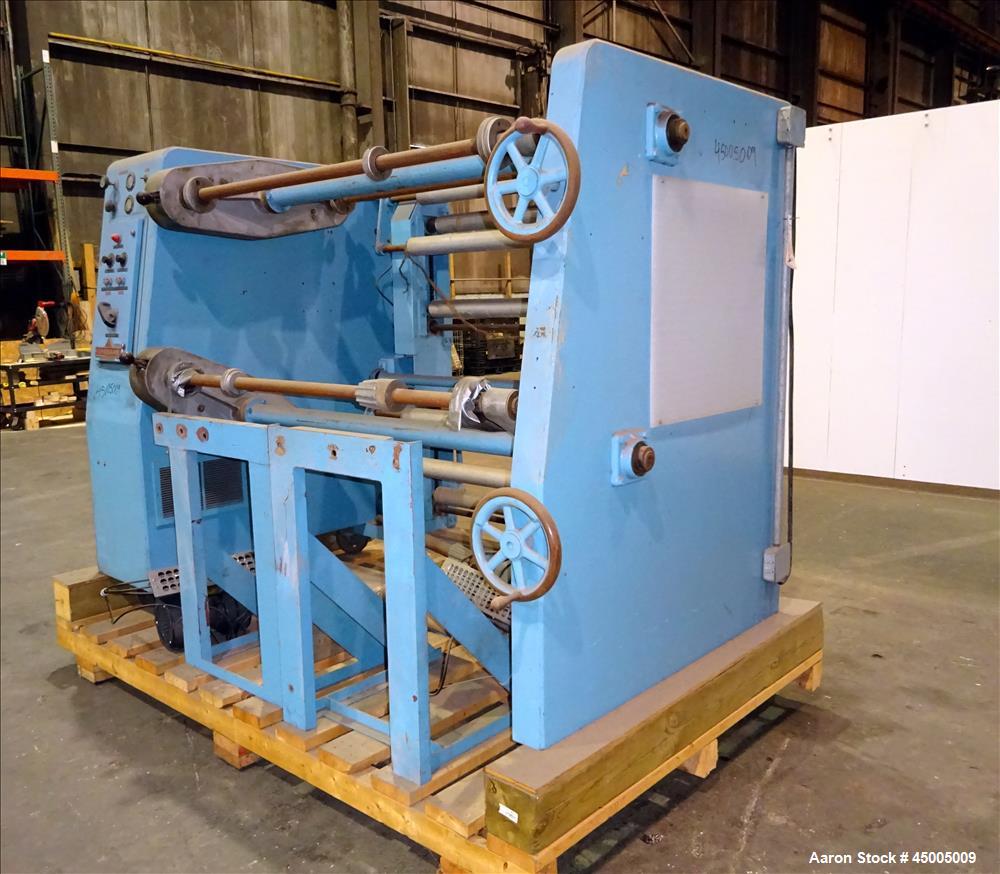 Used Johnson Dual Turret Winder, 48" Wide. Approximate 18" diameter roll capacity.