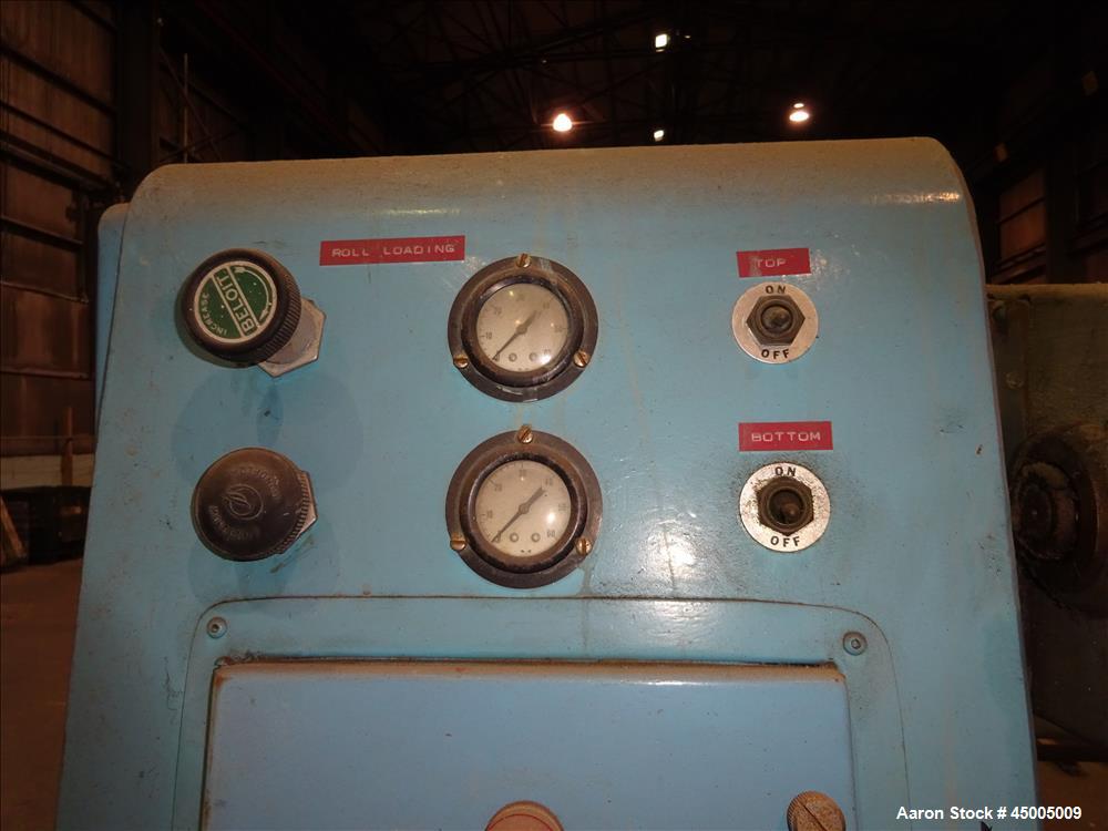 Used Johnson Dual Turret Winder, 48" Wide. Approximate 18" diameter roll capacity.