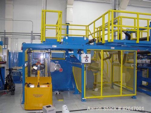 Used TNT Maschinenbau Winding/Cutting System consisting of: (1) Model M.220 dual station cantilevered winder, serial #11.06. Approximate 6’’ diameter core shaft x 70’’ long, approximate 40’’ roll dia...