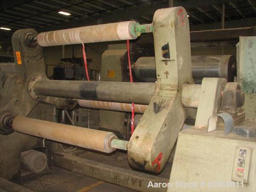 Used Parkinson 66" single turret winder, 3 position, 3 hp, 230/460 volt turret motor drive, independently driven winder motors, 1.5" x 1.5" chucks, 3" cores.