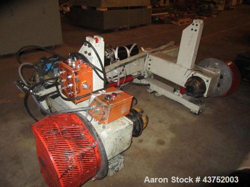 Used 48" Unwind Stand. Shaftless design, rated at 60" OD. With dual Montalvo brakes and a 2 hp hydraulic package for lateral adjustment. Currently set up for 8" chucks.