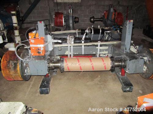 Used 48" Unwind Stand. Shaftless design, rated at 60" OD. With dual Montalvo brakes and a 2 hp hydraulic package for lateral adjustment. Currently set up for 8" chucks.