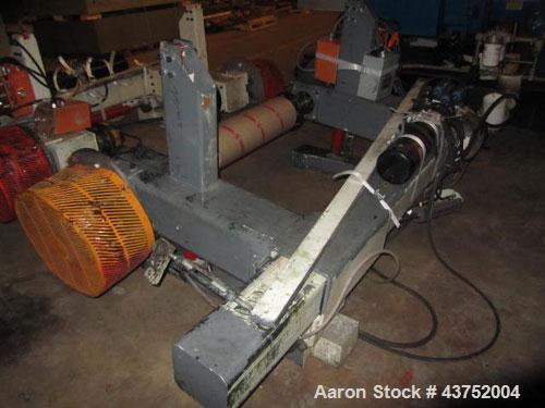 Used 48" Unwind Stand. Shaftless design, rated at 60" OD. With dual Montalvo brakes and a 2 hp hydraulic package for lateral adjustment. Currently set up for 8" chucks.
