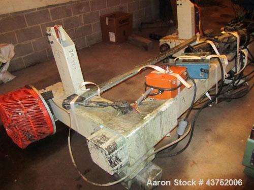 Used 48" Unwind Stand. Shaftless design, rated at 60" OD. With dual Montalvo brakes and a 2 hp hydraulic package for lateral adjustment. Currently set up for 8" chucks..