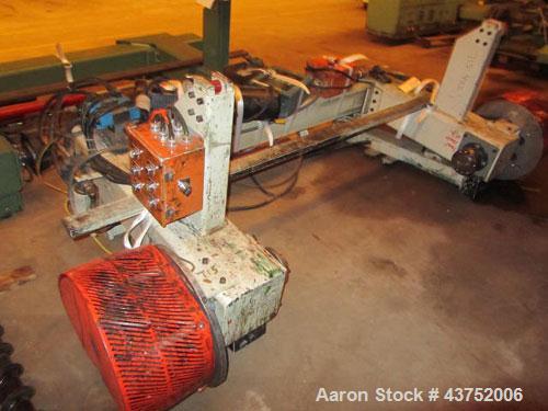 Used 48" Unwind Stand. Shaftless design, rated at 60" OD. With dual Montalvo brakes and a 2 hp hydraulic package for lateral adjustment. Currently set up for 8" chucks..