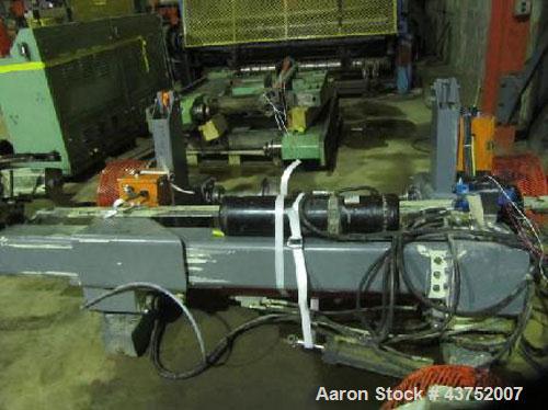 Used 48" Unwind Stand. Shaftless design, rated at 60" OD. With dual Montalvo brakes and a 2hp hydraulic package for lateral adjustment. Currently set up for 8" chucks.