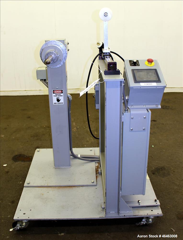 Used Progressive Machine Take-Up Spooling Machine, Model 609-RH. Maximum unwinding speed of 600 feet per minute. Maximum package weight 80 lbs., maximum width 20", maximum O.D. 28". Driven by a 3/4 h...