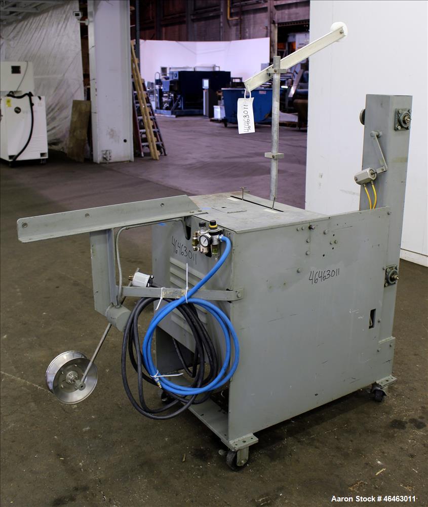 Used Progressive Machine Dual-Spindle Spooler, Model S160CA-RH. Machine is capable of speeds up to 600 feet per minute. Driven by a 1/2 hp, 3/60/230/460 volt, 1725 rpm motor. Has a maximum roll outsi...