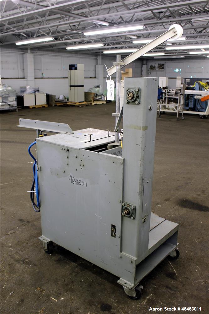 Used Progressive Machine Dual-Spindle Spooler, Model S160CA-RH. Machine is capable of speeds up to 600 feet per minute. Driven by a 1/2 hp, 3/60/230/460 volt, 1725 rpm motor. Has a maximum roll outsi...