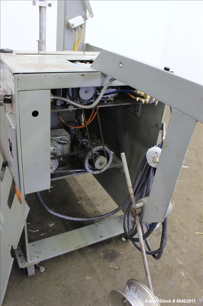Used Progressive Machine Dual-Spindle Spooler, Model S160CA-RH. Machine is capable of speeds up to 600 feet per minute. Driven by a 1/2 hp, 3/60/230/460 volt, 1725 rpm motor. Has a maximum roll outsi...