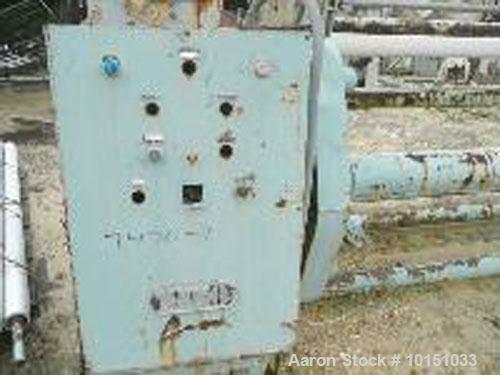 Used 134" Sano Single Turret Winder able to handle up to 24" diameter packages on 3" cores. 3 hp DC motor on each winding station. With power index, lay-on and dancer. Missing winding shafts.