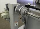 Used Progressive Machine Take-Up Spooling Machine, Model 609-RH. Maximum unwinding speed of 600 feet per minute. Maximum package weight 80 lbs., maximum width 20