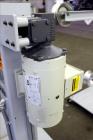 Used Progressive Machine Take-Up Spooling Machine, Model 609-RH. Maximum unwinding speed of 600 feet per minute. Maximum package weight 80 lbs., maximum width 20