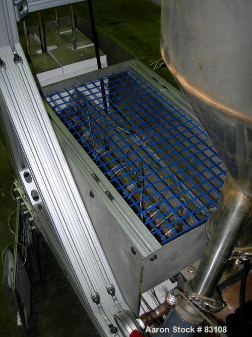 USED: Nylon/wire spinning line consisting of (1) 1" single screw extruder, 30:1 L/D ratio. Electrically heated, air cooled 7 zone barrel. Water cooled feed throat with hopper. Driven by a 5 hp, 3/60/...