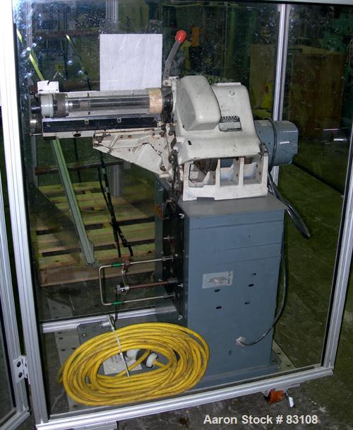 USED: Nylon/wire spinning line consisting of (1) 1" single screw extruder, 30:1 L/D ratio. Electrically heated, air cooled 7 zone barrel. Water cooled feed throat with hopper. Driven by a 5 hp, 3/60/...