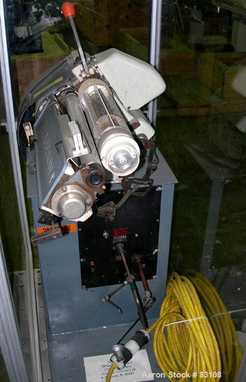 USED: Nylon/wire spinning line consisting of (1) 1" single screw extruder, 30:1 L/D ratio. Electrically heated, air cooled 7 zone barrel. Water cooled feed throat with hopper. Driven by a 5 hp, 3/60/...