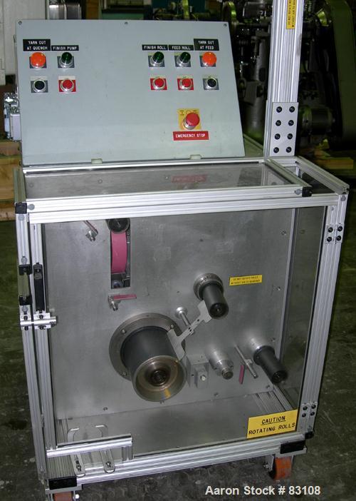 USED: Nylon/wire spinning line consisting of (1) 1" single screw extruder, 30:1 L/D ratio. Electrically heated, air cooled 7 zone barrel. Water cooled feed throat with hopper. Driven by a 5 hp, 3/60/...