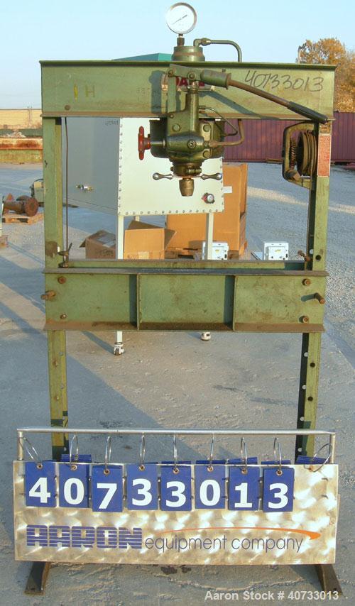 Used Dake press, model 25H, 25 ton.  Manually adjustable base and up/down.  Hydraulic ram.  Mounted on a carbon steel base.


