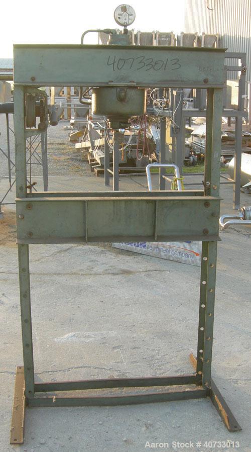 Used Dake press, model 25H, 25 ton.  Manually adjustable base and up/down.  Hydraulic ram.  Mounted on a carbon steel base.


