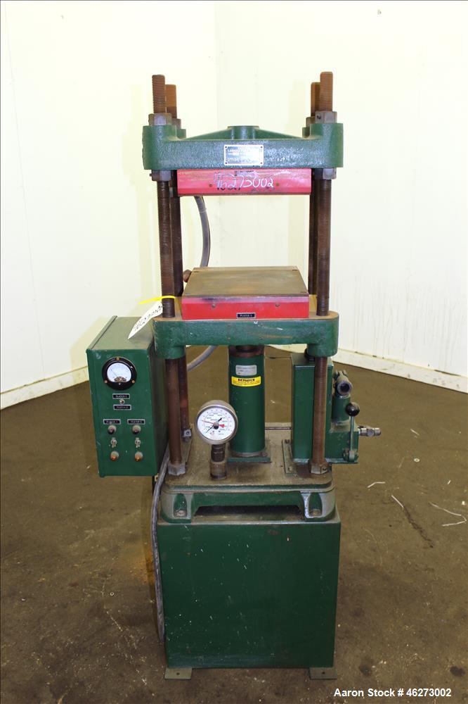 Used Carver Laboratory Manual Press, Model 2699, 30 Ton Clamping Force. Hydraulic, 4 post upstroke type. (2) 12" long x 12" wide electrically heated platens. Maximum temperature 650 degrees F. 6" Str...