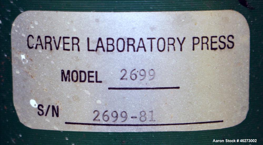Used Carver Laboratory Manual Press, Model 2699, 30 Ton Clamping Force. Hydraulic, 4 post upstroke type. (2) 12" long x 12" wide electrically heated platens. Maximum temperature 650 degrees F. 6" Str...