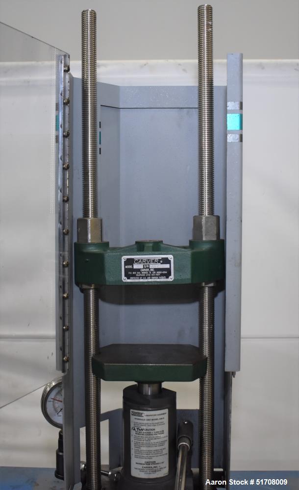 Used Carver Standard Press, Model 3851 (C). 12 Ton clamping force. Non-heated platen size 6" x 6". Ram stroke 5.1". Daylight opening .75 to 18". (2) Tie bars, approximate 1-1/8" diameter. Manual hydr...