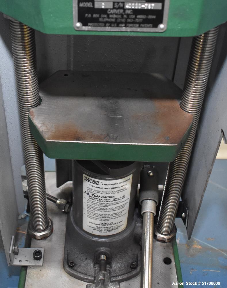 Used Carver Standard Press, Model 3851 (C). 12 Ton clamping force. Non-heated platen size 6" x 6". Ram stroke 5.1". Daylight opening .75 to 18". (2) Tie bars, approximate 1-1/8" diameter. Manual hydr...