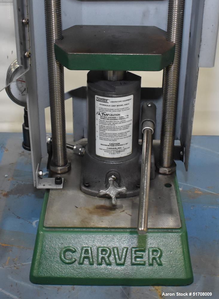 Used Carver Standard Press, Model 3851 (C). 12 Ton clamping force. Non-heated platen size 6" x 6". Ram stroke 5.1". Daylight opening .75 to 18". (2) Tie bars, approximate 1-1/8" diameter. Manual hydr...