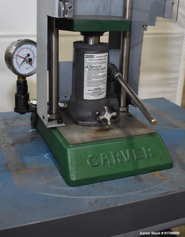 Used Carver Standard Press, Model 3851 (C). 12 Ton clamping force. Non-heated platen size 6" x 6". Ram stroke 5.1". Daylight opening .75 to 18". (2) Tie bars, approximate 1-1/8" diameter. Manual hydr...