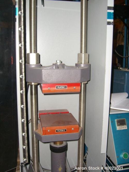 Used Carver Auto "C" Two Post Hydraulic Press. Model 38894D1000. 15 Ton capacity. 6" x 6" heated platen. 6" stroke.0"-15" daylight. mfg. in 1995