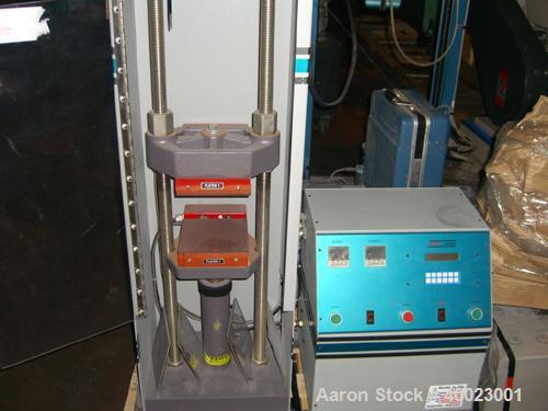 Used Carver Auto "C" Two Post Hydraulic Press. Model 38894D1000. 15 Ton capacity. 6" x 6" heated platen. 6" stroke.0"-15" daylight. mfg. in 1995