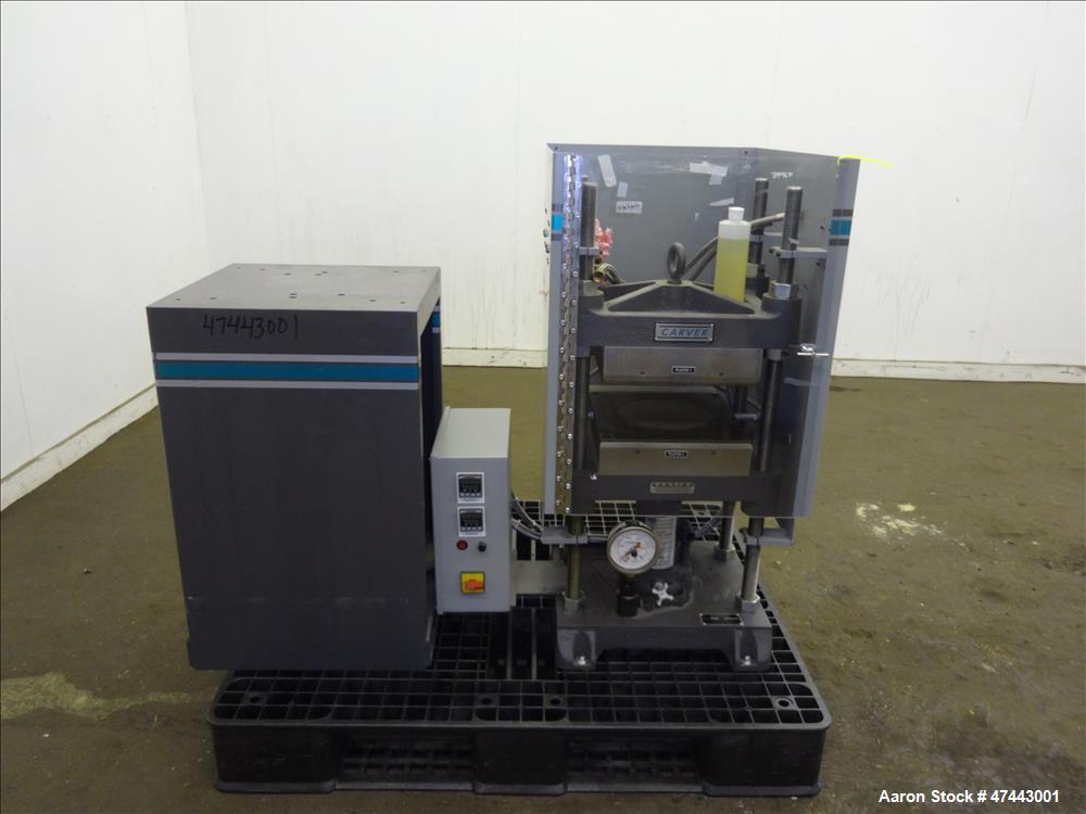 Used- Carver Heated Four Post Manual Hydraulic Press, Model 12-12H (4122), 12 To