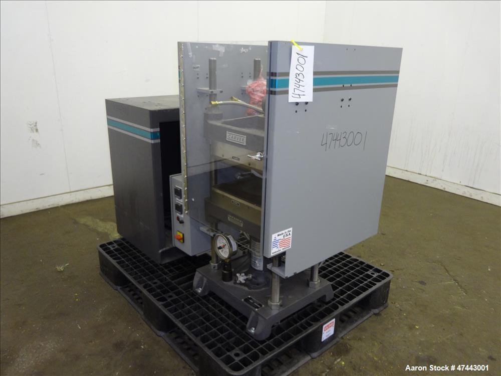 Used- Carver Heated Four Post Manual Hydraulic Press, Model 12-12H (4122), 12 To