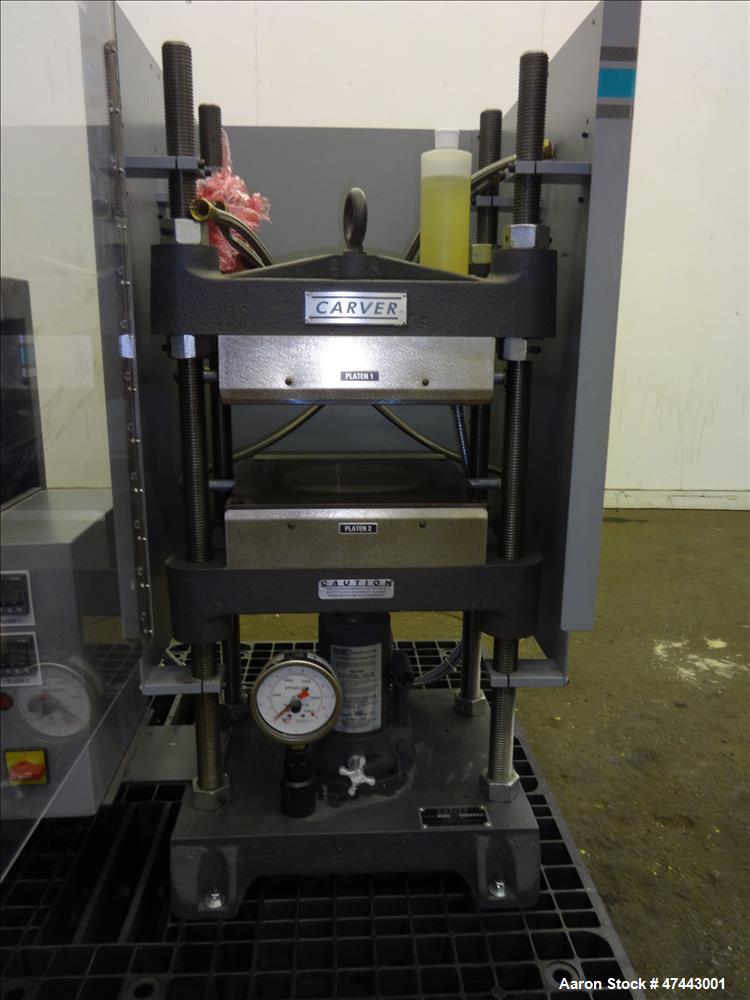 Used- Carver Heated Four Post Manual Hydraulic Press, Model 12-12H (4122), 12 To