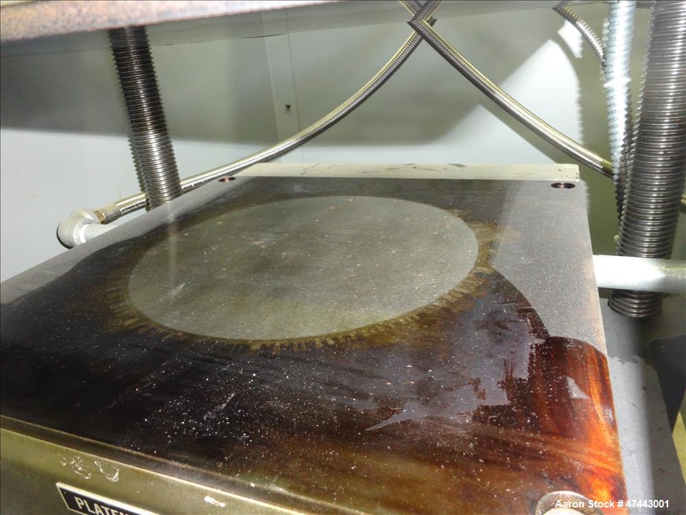 Used Carver Heated Four Post Manual Hydraulic Press, Model 12-12H (4122), 12 To