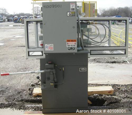 Used:  Carver 4 Post Manual Hydraulic Press, Model 4902. 30 ton clamp force capacity.  (2) 24" x 24" electrically heated, water cooled platens, rated to 650 degrees F.  6" ram stroke, 1-4" daylight o...
