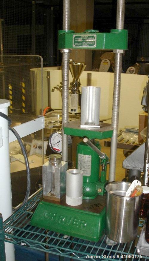 Used Carver Manual Hydraulic Lab Press, 12 Ton Clamping Force, Model C. Requires (2) 6" x 6" platens. Ram stroke 5.1", daylight opening 3/4" to 18".