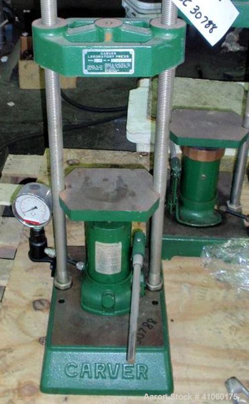 Used Carver Manual Hydraulic Lab Press, 12 Ton Clamping Force, Model C. Requires (2) 6" x 6" platens. Ram stroke 5.1", daylight opening 3/4" to 18".