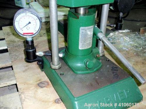 Used Carver Manual Hydraulic Lab Press, 12 Ton Clamping Force, Model C. Requires (2) 6" x 6" platens. Ram stroke 5.1", daylight opening 3/4" to 18".