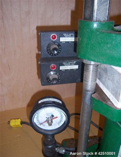 Used Carver Hydraulic Laboratory Press, Model C.  12 ton, manual, bench top, heated 6" platens. Each platen is flat, aluminum, has an installed dial type temperature gauge and has manual temperature ...