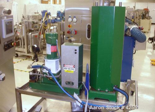 Used Carver Press, Model C, 15 ton compression pressure, with hydraulic pump with 1/2 hp 90 volt motor, pump serial #2822-324, press serial #31000-998.