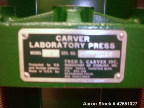 Used Carver Press, Model C, 15 ton compression pressure, with hydraulic pump with 1/2 hp 90 volt motor, pump serial #2822-324, press serial #31000-998.