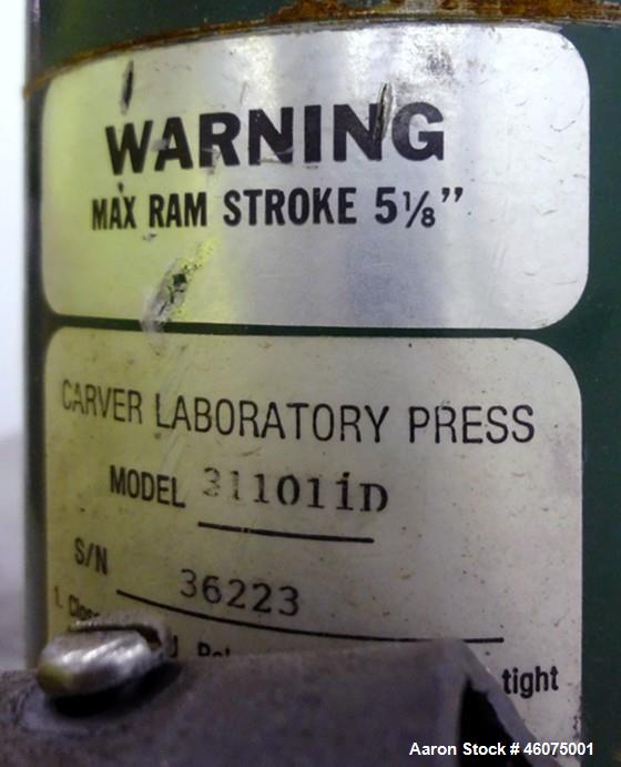 Used Carver Manual (2) Column Hydraulic Laboratory Press, 12 Ton Clamping Force, Model C. (2) 6" Wide x 6" long electrically heated platens, (2) 6" wide x 6" long water cooled platens. Maximum temper...